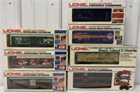 7 Lionel train cars in boxes