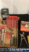 Assorted tools, wrenches, bits, rasps, stapler,