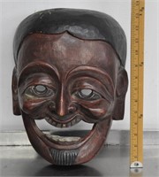 Wood carved face mask wall decor