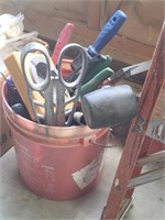 Bucket of tools shears mallet and more