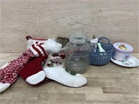 5 Christmas stockings, glass jar, basket w/ body