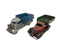 (2) tin dump truck toys