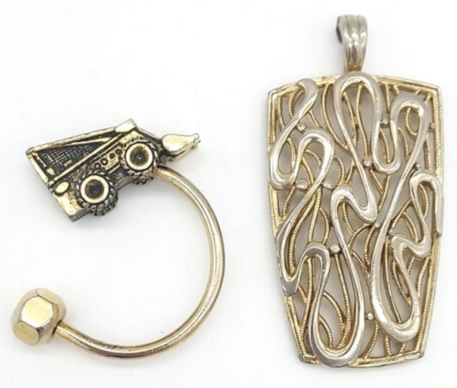 (II) Excavator Key Ring & Pendant. Abstract