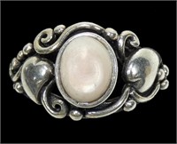 Sterling silver bezel set oval mother of pearl