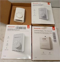 4 Honeywell home thermostats