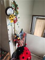 Lady bug decor, wind chimes, tractor seat/ lady