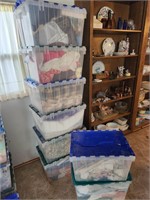 8 totes & contents. Blankets, clothes, material &