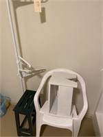Towel and clothing holder, green and white stool