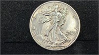 1936 Silver Walking Liberty Half Dollar higher
