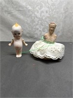 Porcelain kewpie doll and Lady Half doll