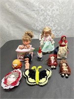 Assortment of small dolls and accessories