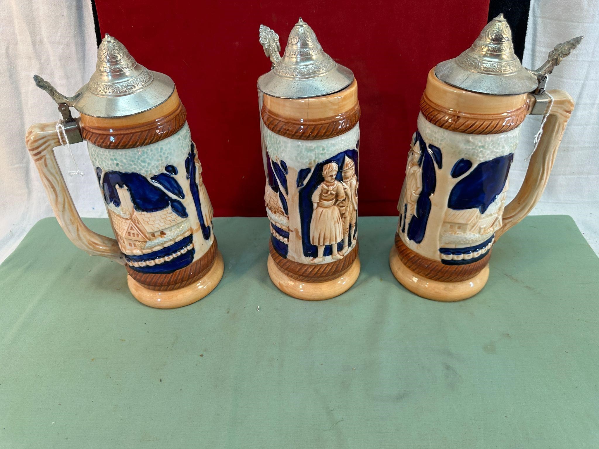 3 STEINS WITH LIDS