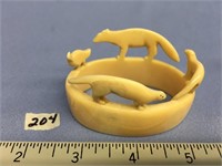 Ivory napkin ring with 4 animals on top, 2.75"