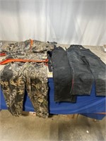 Assorted hunting clothes, coveralls (one Carhart)