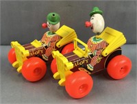 2 identical fisher price jalopy toy cars