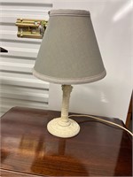 Heavy metal lamp painted with gray shade