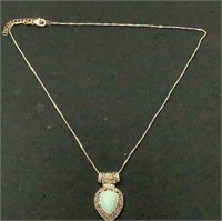 Sterling Silver Necklace W light blue stone