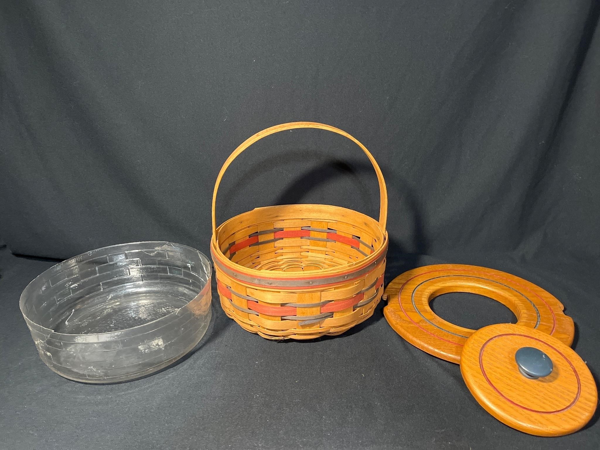 Longaberger Handwoven basket with lid.