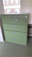 Large green 4 drawer filing cabinet