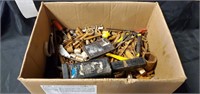 Box of rusty sockets and pliers