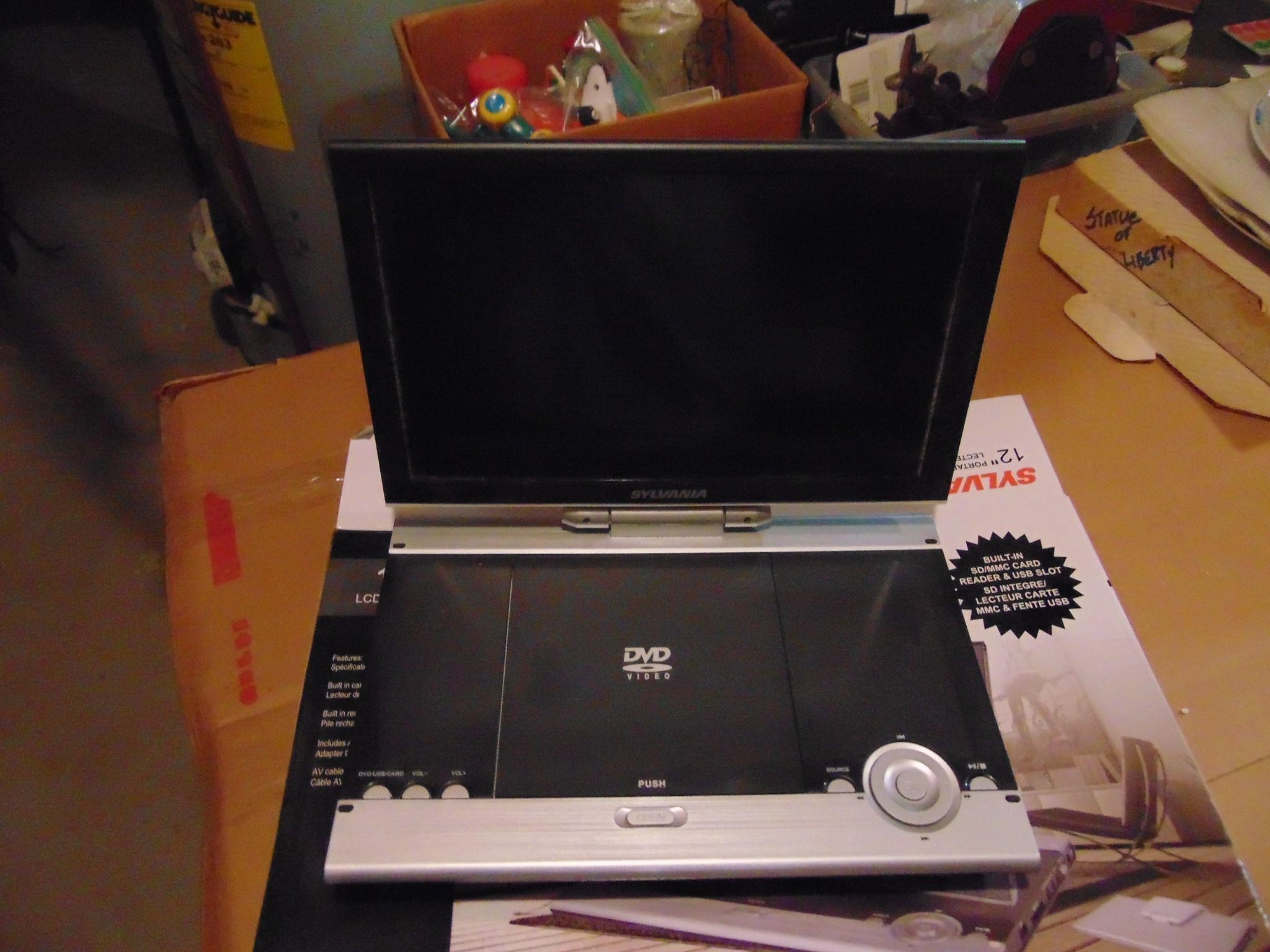 Small DVD player, no power cord, untested