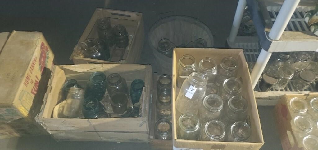 Lot of various canning jars.