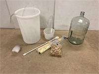 Wine making tools and a glass Carboy