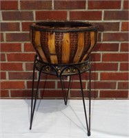 Metal and wicker planter. 21 tall and 12"