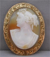 ANTIQUE CAMEO WITH 14K BEZEL.