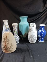 Six Asian inspired vases