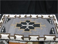 56" X 29" Woven Rug, Pair of Moccasins