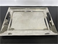 Metal serving tray with decorative handles