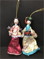 Blown glass ornamental geishas
