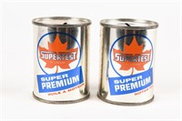 2 SUPERTEST PREMIUM 4 OZ. ADV. COIN BANKS