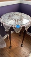 TABLE THAT FOLDS UP TO HALF MOON WITH GLASS TOP