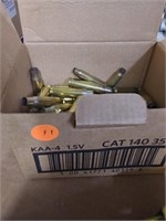 small box of spent brass casings