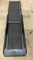 Pet ramp with easy carry handle, folds to better