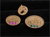 10K HCMH service pins set with diamonds, rubies