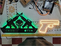 2 neon gun signs 1 pistol 1 Game Over skull rifles