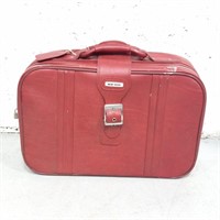 Vintage red new Vista suitcase with keys