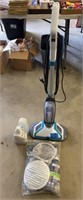 Bissell Floor finishing machine with pads