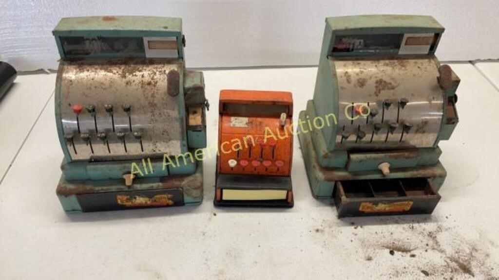 Three vintage cash registers, Tom Thumb, Aster