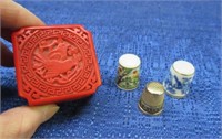 small red asian box & 3 thimbles