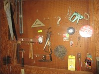 All handsaws, hammers, other items on pegboard