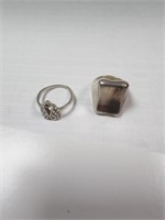 2 silver rings 6 & 7 18 grams marked 925