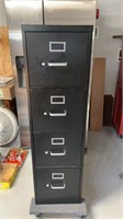 Four drawer upright filing cabinet