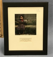 Matted and framed photograph of an Indian girl, fr