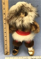 13" Alaskan native doll with various furs, includi