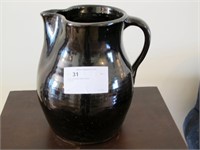 Brown stoneware batter pitcher,