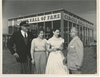 8x10 4 people in front of circus Hall of Fame